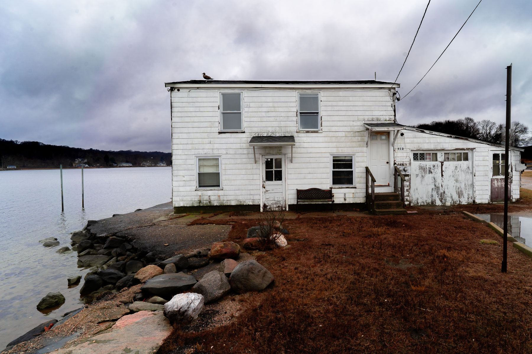 A white house along Narrow River in Narragansett, Rhode Island